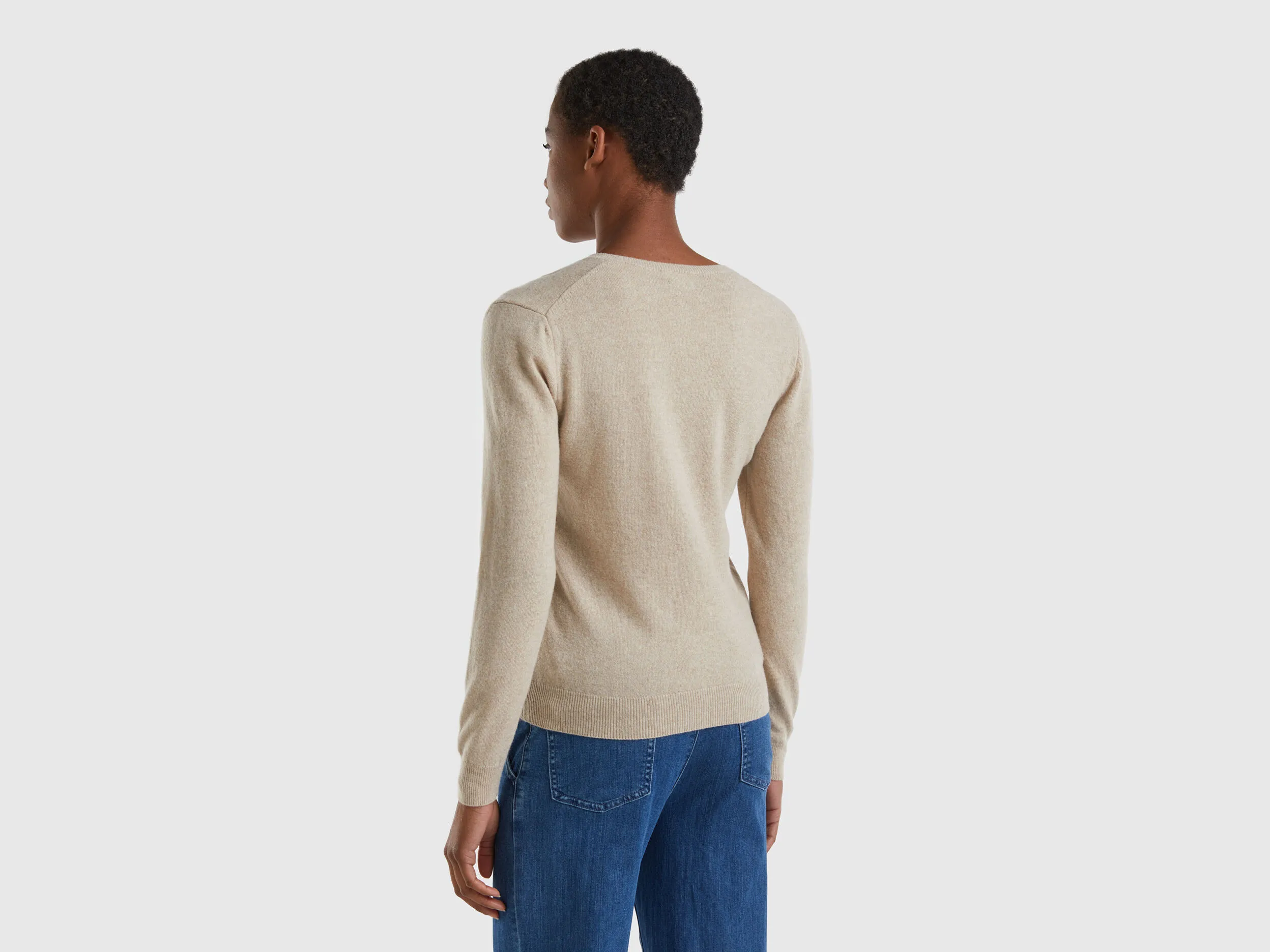 Beige V-neck sweater in pure Merino wool - Beige | Benetton