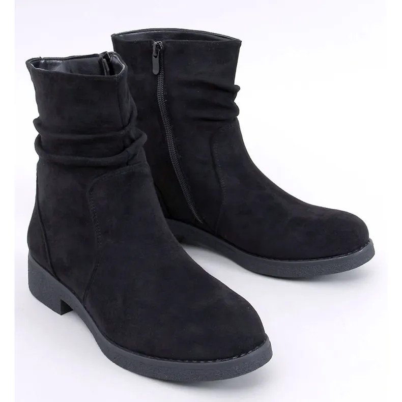 Bracy Black ruffled ankle boots